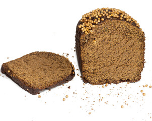 Sliced black bread sprinkled with coriander. Borodino bread. Flour product.  Bread with spices on white background