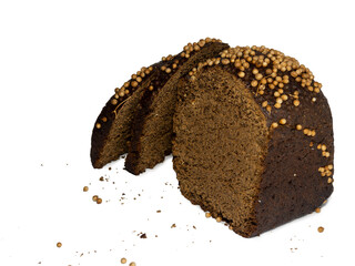 Sliced black bread sprinkled with coriander.   Flour product. Healthy food. Vegetarianism. Bread with spices on white background