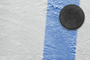 Ice hockey puck with blue line