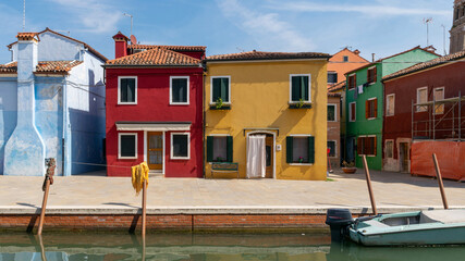 Fototapeta na wymiar Burano italy. Venice island color street. Paint building house in travel Europe Venezia city. Venice Province, Veneto Region, Northern Italy.