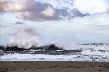 Crushing ocean waves. Scenic sky and tranquil beach line