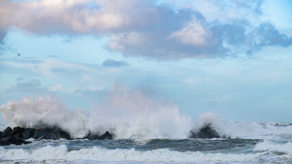 Crushing ocean waves. Scenic sky and tranquil beach line