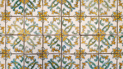 typical colorful sicilian ceramic floor and wall tiles with flower patterns and design