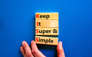 KISS keep it super and simple symbol. Concept words KISS keep it super and simple wooden blocks....