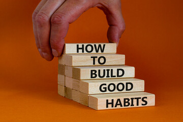 Build good habits symbol. Wooden blocks on beautiful orange background, copy space. Words 'How to...