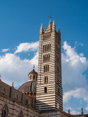 Fototapeta na wymiar Siena Cathedral Campanile Bell Tower, Spire or Belfry in Tuscany, Italy