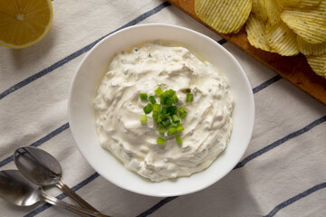 Homemade Clam Dip with Potato Chips, top view. Flat lay, overhead, from above.