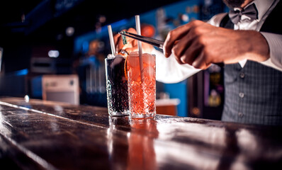 Bartender makes a cocktail at the beerhouse