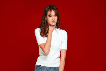 Sick young woman holding neck, suffering pain throat, tonsillitis, hard to swallow, voice loss on...
