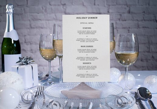 Cardboard Restaurant Menu on a Plate of Festive White Holiday Table