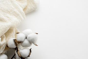 Top view of a white table and a white cotton napkin.  Kitchen ecological background.