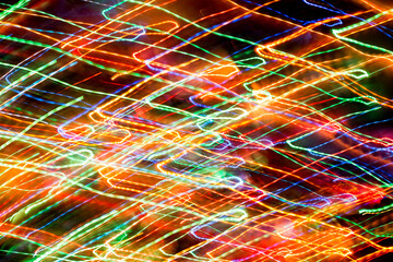 Abstract Multicolored Glowing Shapes as Background.Long exposure.