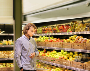 Man buying fruits at the market