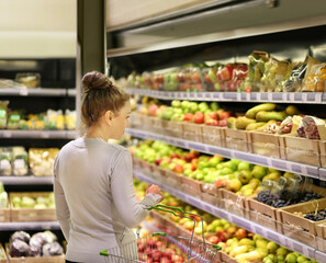 Woman buying fruits at the market