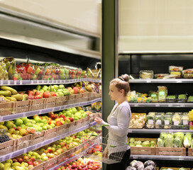 Woman buying fruits at the market