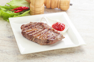 Grilled rib-eye steak beef meat