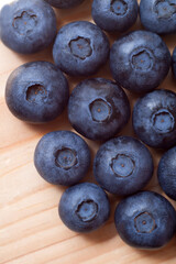 Healthy blueberries on a wooden desk
