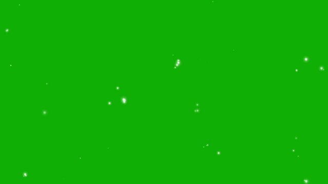 An illustration of shining sparkles on a green screen
