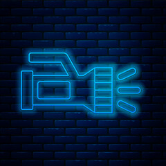 Glowing neon line Flashlight for diver icon isolated on brick wall background. Diving underwater equipment. Vector