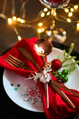 Traditional Christmas table place setting. Holidays background.