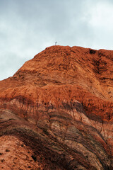 cross over a red hill