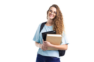 Young smiling student woman holds books while looking at camera. Over white background. Education. - obrazy, fototapety, plakaty