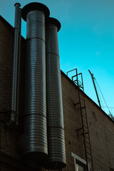 Majestic chimneys against the blue sky