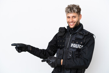 SWAT caucasian man isolated on white background pointing finger to the side and presenting a product