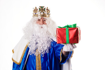 A magician with a present on a white background