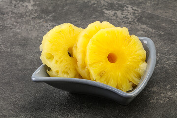 Sweet pineapple rings in the bowl