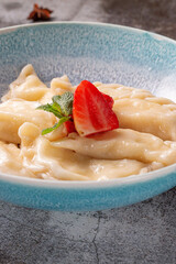 Dumplings, filled with strawberries. A healthy, sweet breakfast