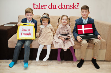 Four kids show inscription learn danish. Foreign language learning concept. Taler du dansk?