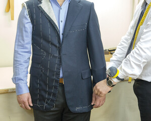 Work done by the tailor and the master working at the workshop