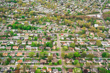 Aerial view of suburban community on Long Island New York with homes and streets visible