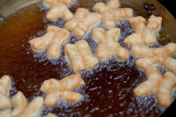 closeup make Youtiao, deep-fried doughstick, Patongo