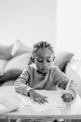 Naklejka premium Black Girl Doing Homework