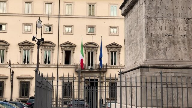 Italian and european flags on Chigi Palace in Rome