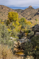 View of rocky cliffs on a sunny day with wispy clouds in Mt Lemmon, Tucson Arizona, USA