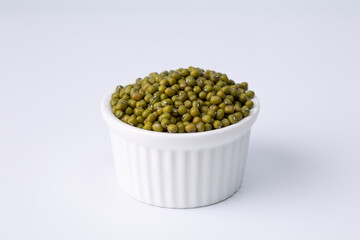 mung bean in white bowl on white background studio shot