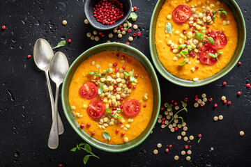 Delicious lentil soup made of legume vegetables and peppers.