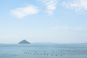 Sea and an island in Seto Inland Sea in autumn, Japan