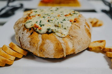 Closeup shot of a delicious meal with bread on the t