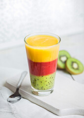 Fresh fruit mousse smoothie in three color layers