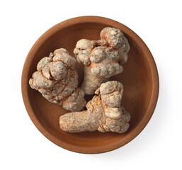 Dried notoginseng in the wooden bowl,  isolated on white background, top view