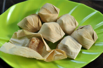 Close-up of the Indonesian traditional food wajit on green plate