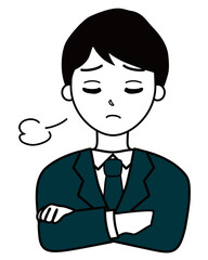 ため息をつくスーツを着た男性会社員