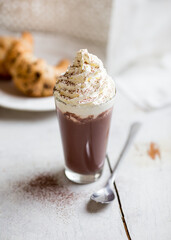 Iced chocolate with whipped cream and cocoa