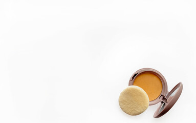 Compact powder for natural color make-up close-up isolated on a white background