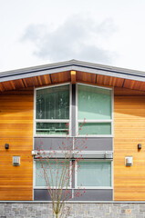 The roof of the house with nice window.