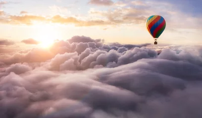  Dramatic Mountain Landscape covered in clouds and Hot Air Balloon Flying. 3d Rendering Adventure Dream Concept Artwork. Aerial Image from British Columbia, Canada. Sunset or Sunrise Sky © edb3_16